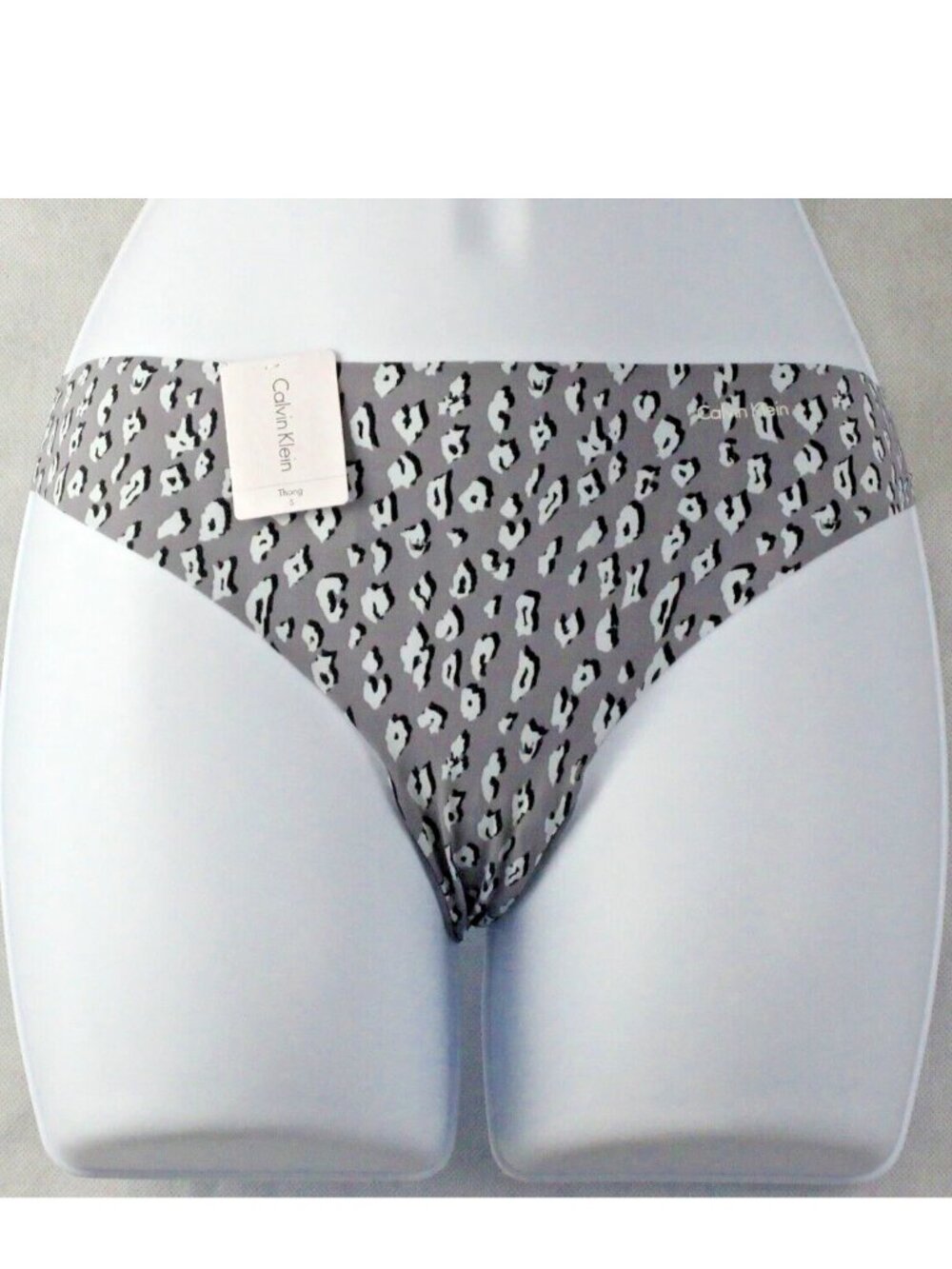 Calvin Klein Women's Invisibles Thong Panty Underwear, Pewter Cheetah, Small